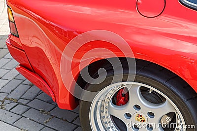 Aft part of the red sports car Porsche 944 at the cityâ€™s Retro Car Show Editorial Stock Photo